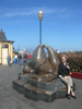 Amy by a sea lion statue