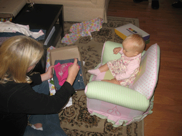 Opening gifts with Mommy