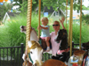 On the carousel with Mommy