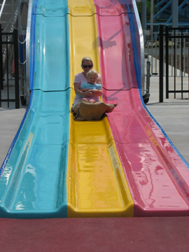 On the slide with Mommy
