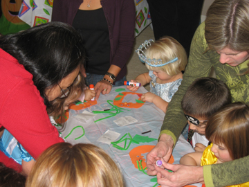 Making a pumpkin picture frame at Tara's birthday party