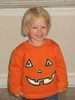 Kaitlyn in her pumpkin shirt