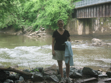 Amy in front of the raging Susquehanna River