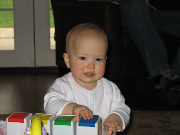 Sydney playing with a toy