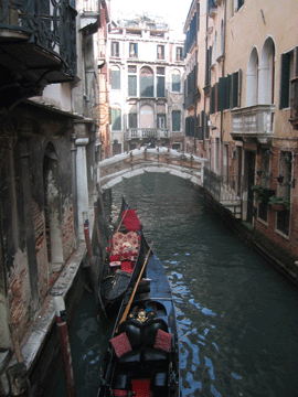 Gondolas parked along a canal