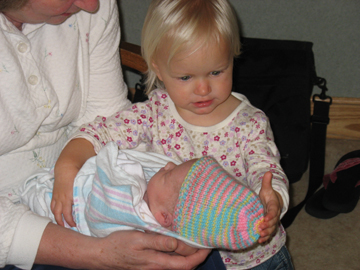 Kaitlyn looking after her new little sister